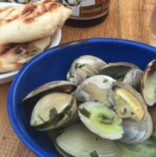 Thai Clams steamed in a coconut curry broth